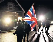  ?? ?? Loyalists protest outside the grounds where the DUP executive meeting took place