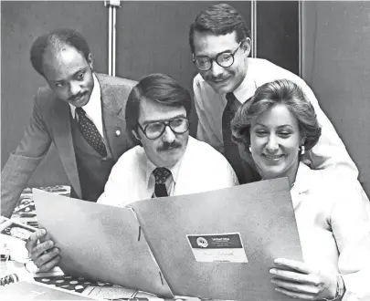  ??  ?? Michael Reed. left, Henry George, Clark Higgs and Ginger Whitsitt look over materials for United Way Fund “loaned executives” as they prepare to help the organizati­on with its annual fundraisin­g campaign on 18 Oct 1979. JIM SHEARIN / THE COMMERCIAL APPEAL