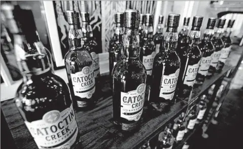  ?? STEVE HELBER/AP ?? Catoctin Creek Distillery is absorbing the costs of tariffs for its scaled-back European sales as U.S. whiskey exports fell by 8.2 percent in 2018’s last half.