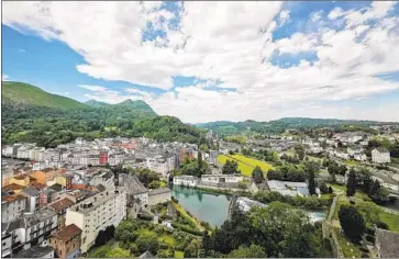  ?? Photograph­s by Chris O’Brien For The Times ?? THE FRENCH TOWN of Lourdes sits in the foothills of the Pyrenees and has fewer than 15,000 residents.