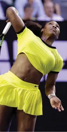  ?? AARON FAVILA/THE ASSOCIATED PRESS ?? Serena Williams made quite the fashion statement at the Aussie Open on Friday during her 6-1, 6-1 demolishin­g of 18-year-old Daria Kastkina.