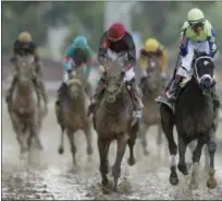  ?? MATT SLOCUM — THE ASSOCIATED PRESS ?? John Velazquez rides Always Dreaming to victory in the 143rd running of the Kentucky Derby horse race at Churchill Downs on Saturday in Louisville, Ky.