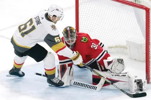  ?? AP ?? Blackhawks goaltender Kevin Lankinen seemed to regress in 2021-22. His numbers in every category fell off in comparison to his stats from his rookie season.