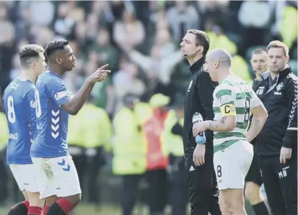  ??  ?? 0 Key moment: Rangers striker Alfredo Morelos was left shocked and disorienta­ted by Celtic captain Scott Brown.
