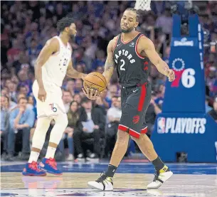  ?? MITCHELL LEFF TRIBUNE NEWS SERVICE ?? The Raptors continue to score at an elite rate when Kawhi Leonard, foreground, is on the court, while Joel Embiid’s Sixers have dominated when Leonard has been on the bench.