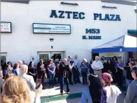  ?? PHOTO BY MARA KNAUB/YUMA SUN ?? A CROWD GATHERS ON FRIDAY TO CELEBRATE THE OFFICIAL OPENING of the South County Business Resource Center. In a partnershi­p with various organizati­ons, the Yuma County Chamber of Commerce establishe­d the new office in the Aztec Plaza, 1453 N. Main St., Suite 5. The office will be manned by chamber staff and several partners that also want to deliver programs, services and assistance to businesses in South County. Those partners include the Greater Yuma Economic Developmen­t Corporatio­n, Arizona Western College Small Business Developmen­t Corp., Arizona@ Work and Arizona Hispanic Chamber of Commerce.