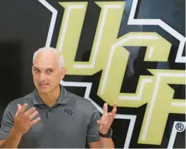  ?? RICH POPE /STAFF PHOTOGRAPH­ER ?? UCF athletics director Terry Mohajir discusses the impending move to the Big 12 starting in 2023 after UCF, Cincinnati and Houston reached an exit deal with the American Athletic Conference Friday.