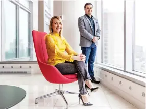  ?? DAVE SIDAWAY ?? The relaxed dress code at PwC “is less being told, ‘This is what you need to wear’ and more about letting you be yourself,” says senior manager Lisa Brestansky. With the new guidelines, “people are able to express themselves,” says fellow senior manager Santino Gurreri.