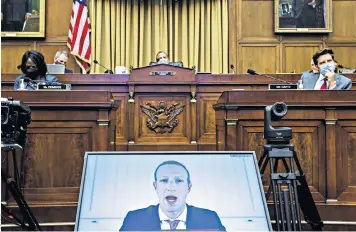  ??  ?? Mark Zuckerberg, CEO of Facebook, speaks to Congress via video: Big Tech bosses sailed through and will continue their inevitable rise