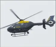  ?? Picture: Andy Clark ?? The police helicopter circled above Ashford on Tuesday afternoon