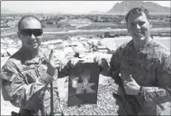  ??  ?? Contribute­d photo PFC Curtis Grace, left, with a buddy at Combat Outpost Sperwan Ghar, Afghanista­n.