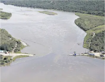  ?? JASON FRANSON/THE CANADIAN PRESS/FILES ?? Husky Energy has been given more time to prepare two technical reports on the pipeline oil spill this summer near Maidstone.