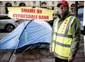  ?? ?? PROTEST: Mr Guidi outside the Clydesdale Bank offices in Glasgow in 2019