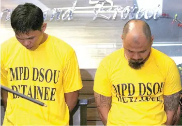  ?? PHOTO BY RUY L. MARTINEZ ?? MAUTE MEN Two suspects in the Monday’s foiled attempt to bomb Roxas Boulevard in Manila, Rashid Kilala and Jaiher Guinar, are shown to the press on Thursday. They were allegedly members of a five-man cell that wanted to divert attention from the...