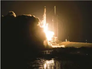  ?? JOEL KOWSKY/AP ?? A SpaceX Falcon 9 rocket carrying the company’s Dragon spacecraft is launched on NASA’s SpaceX Crew-6 mission on Thursday, at NASA’s Kennedy Space Center in Florida.