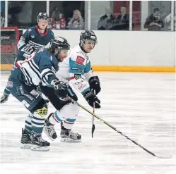  ?? Picture: Derek Black. ?? Dundee Stars’ Gabriel Levesque comes under pressure from Giants’ Matt Towe.