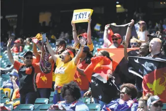  ?? Mark Ralston / Getty Images ?? Every nation appeared to have its own cheering section at AT&amp;T Park. The fans of Papua New Guinea might have been few in number, but were large in spirit after a try against Australia.