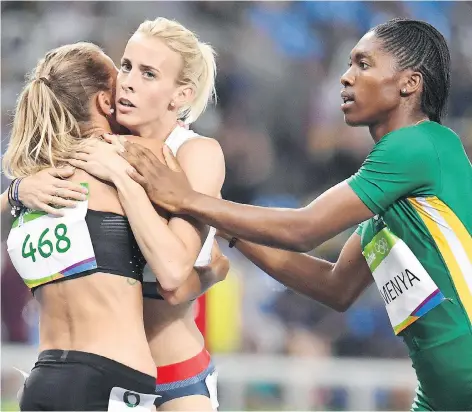  ?? FRANK GUNN/ THE CANADIAN PRESS ?? Ontario’s Melissa Bishop, left, is embraced by Great Britain’s Lynsey Sharp, centre, and gold medallist Caster Semenya of South Africa following the women’s 800-metre final Saturday in Rio. Semenya won the gold medal with a time of 1:55.28