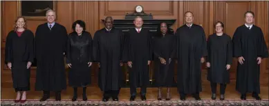  ?? FRED SCHILLING — U.S. SUPREME COURT VIA THE ASSOCIATED PRESS ?? Members of the Supreme Court pose during Associate Justice Ketanji Brown Jackson's formal investitur­e ceremony at the Supreme Court in Washington on Friday. From left are Amy Coney Barrett, Neil Gorsuch, Sonia Sotomayor, Clarence Thomas, Chief Justice John Roberts, Jackson, Samuel Alito, Elena Kagan and Brett Kavanaugh.
