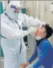  ?? HT ?? A patient’s sample being collected at the Dera Bassi civil hospital on Friday.