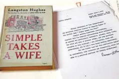  ?? TERRENCE ANTONIO JAMES/CHICAGO TRIBUNE ?? Documents and memorabili­a related to Vivian Harsh, Chicago’s first black librarian, are kept at the Carter G. Woodson Regional Library in Chicago. A book by Langston Hughes and a review by Harsh are seen on Friday.