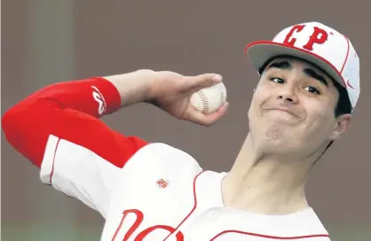  ?? PHOTOS BY JOHN SMIERCIAK/POST-TRIBUNE ?? Crown Point’s Will Pettit pitches during Tuesday’s game against Lake Central.