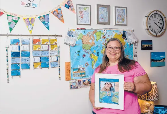  ?? TODD ANDERSON/THE NEW YORK TIMES ?? Jennifer Juenke, who has volunteere­d to take part in a Royal Caribbean test sailing, shows off her cruise memorabili­a May 23 at home in Summerfiel­d, Florida. Cruise lovers have signed up to take part in sailings designed to test new health and safety measures.