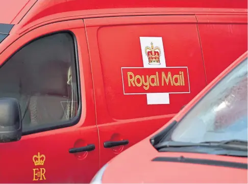  ??  ?? SAFETY FEARS: The Communicat­ion Workers Union says Royal Mail should take on extra vans to safeguard workers.