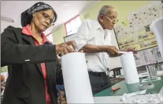  ?? DISTRICT SIX MUSEUM ?? Joyce Cloete and Jeffrey Keshwa make lanterns during the District Six Museum lanternmak­ing workshop ahead of the 13th annual Emancipati­on Day ‘Walk in the Night’.|