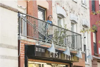  ?? GEORGE ETHEREDGE/THE NEW YORK TIMES ?? Maria Gonzalez, seen Nov. 14 in East Harlem, lives above the restaurant she owns.