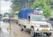  ?? HT PHOTO ?? Vehicles carrying essential goods move towards Aizawl from Assam, on Sunday.