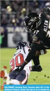  ??  ?? BALTIMORE: Running Back Javorius Allen #37 of the Baltimore Ravens carries the ball as he is tackled by cornerback Kevin Johnson #30 of the Houston Texans in the fourth quarter at M&T Bank Stadium. — AFP