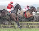  ?? Pictures / Race Images, NZME ?? Aaron Kuru on his way to winning the Wellington Steeplecha­se on Amanood Lad. Below: Aaron Kuru and Paul Nelson celebrate the brace.