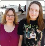  ?? STAFF PHOTOS BY JOHN WHARTON ?? Meredith Skotnicki, left, encourages her daughter Natalie Lloyd-Schultz’s support for Bernie Sanders.