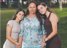  ??  ?? Kelly Hardy, 44, has a terminal illness and hopes attending her own funeral has made life easier for daughters Jordan, 11, and Kyah, 15, once she’s gone. Picture: Glenn Hampson