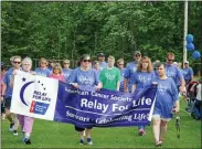  ?? FILE PHOTO ?? Survivors walk a lap around Vets Field at the Relay for Life of Madison County on Saturday, June 2, 2018.