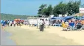  ?? PTI FILE ?? Tourists at a beach in Goa.