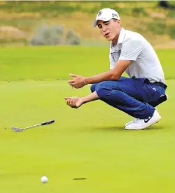  ??  ?? Alejandro Armijo can’t believe he missed this birdie putt on Saturday during second-round action of the city tournament at Arroyo del Oso Golf Course.