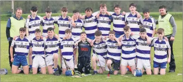  ?? ?? Killavulle­n U15 team that participat­ed in Féile 2023, with their mentors Barry Murphy and Michael Cronin.