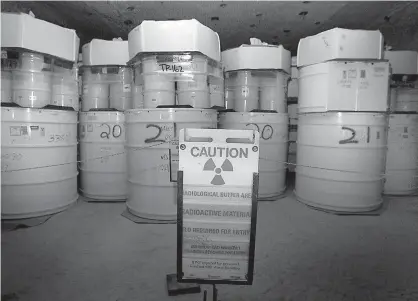  ?? Brian Vander Brug/ Los Angeles Times/ TNS ?? ABOVE: Drums of highly toxic radioactiv­e transurani­c wastes set inside a salt cavern March 20, 2006, at the Waste Isolation Pilot Plant in Carlsbad, N.M.