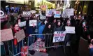  ??  ?? Protesters held ‘Boo Bernardo’ signs directed at cast member Amar Ramasar. Photograph: Stephen Lovekin/Variety/REX/ Shuttersto­ck