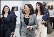  ?? BILL CLARK/CONGRESSIO­NAL QUARTERLY ?? Kamala Harris, D-Calif., walks through the Senate subway on Dec. 7, 2016 while speaking with reporters in the Capitol