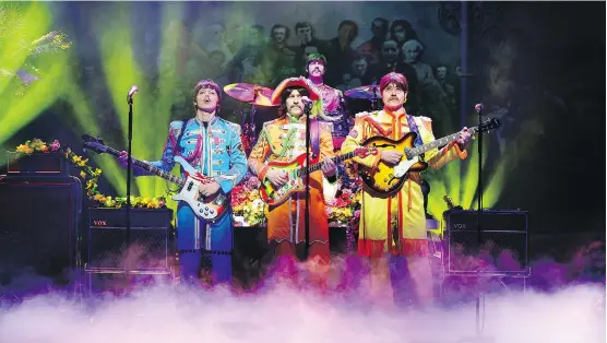  ?? PAUL COLTAS ?? Part of the Beatles tribute show Let It Be includes a homage to the Fab Four’s Sgt. Pepper Lonely Hearts Club Band era — re-creating the clothing and instrument­s used circa 1967.