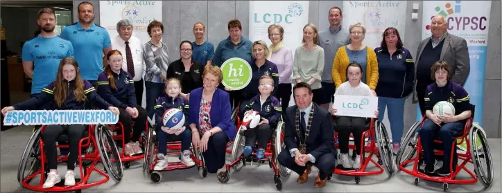  ??  ?? Sports wheelchair users at Wexford County Buildings with council chairman John Hegarty, Kathleen Codd Nolan, chairperso­n, LCDC, and Sports Active staff.