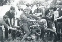  ??  ?? Horsing around at Woburn in 1968. On the bike is Horse, known throughout rallying circles for his exploits with his home-made BSA. On the left is Colin Armitage; second left is Roger Halfyard. In the white jumper is Suzuki Alan and next to him is Cambridge Michael, brother of Cambridge Dave (7th on left); Arthur (?); Phil (?); and then on the far right, Tottenham Les.
