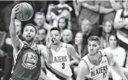  ?? Ted S. Warren / Associated Press ?? Warriors guard Stephen Curry, left, said the team was motivated by extra days off in Game 4 comeback.