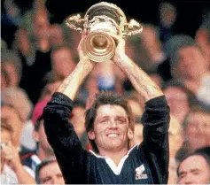  ?? NZPA ?? All Blacks captain David Kirk lifts up the William Webb Ellis trophy after his side beat France in the 1987 final.