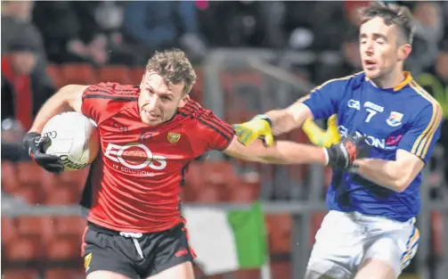  ??  ?? On target: Barry O’Hagan’s accuracy was central to Down’s crucial win over Longford at Pairc Esler, Newry