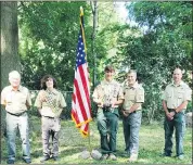  ?? SUBMITTED ?? Rafe Proctor, right of flag, is shown with Jim Gilbert, left, Eagle Scout Award chairman for NEOSSAR #12; Steve Hinson, past state society president of the OHSSAR; Andrew Proctor, his father; Lance Beebe, OHSSAR Eagle Scout chairman; Jim Pildner, chapter president, NEOSSAR #12; and Troy Bailey, vice president of the OHSSAR.