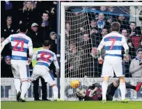  ??  ?? SPOT-ON Lee Camp dives to keep out Nahki Wells penalty